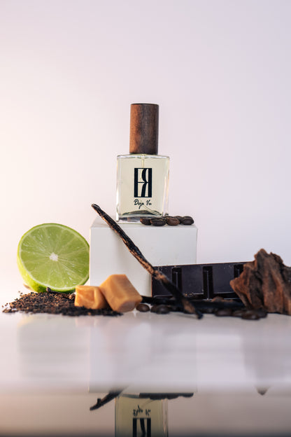 Perfume bottle with ingredients on a white background